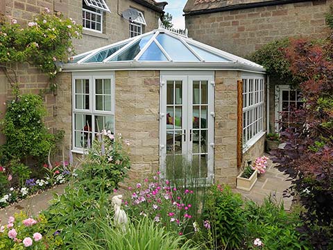 Stone Built Orangery with White UPVC Frames
